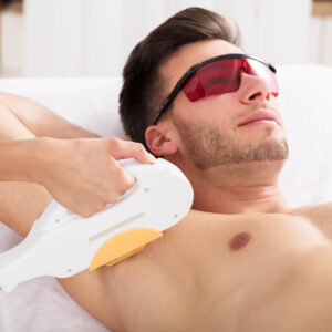 Man Having Underarm Laser Hair Removal Treatment